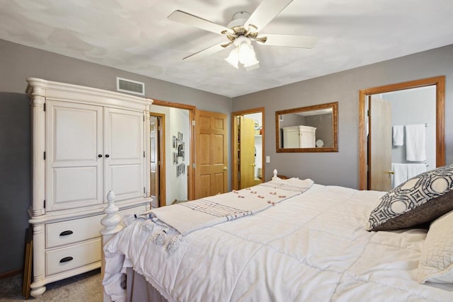 bedroom featuring connected bathroom, ceiling fan, and carpet floors