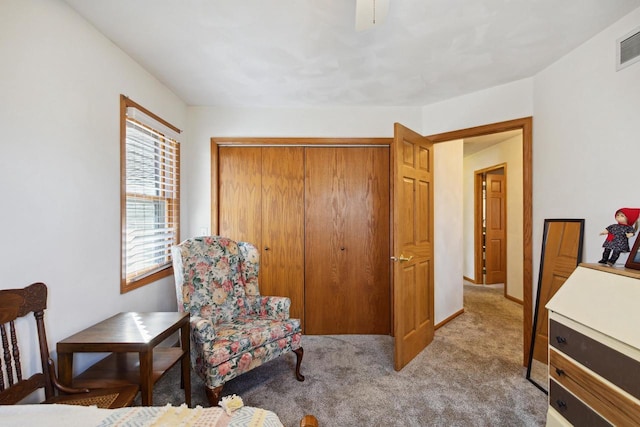 living area featuring light colored carpet