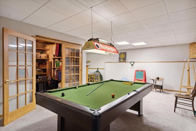 recreation room with carpet flooring, a paneled ceiling, and pool table