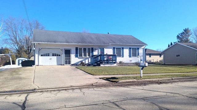 ranch-style house with a front yard and a garage