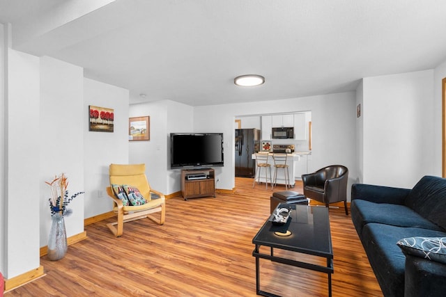 living room with light wood-type flooring