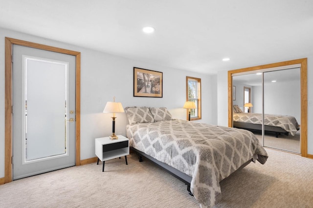 carpeted bedroom featuring a closet