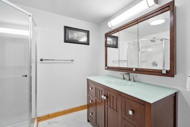 bathroom with vanity and an enclosed shower