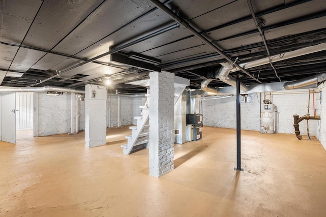 basement with heating unit and water heater