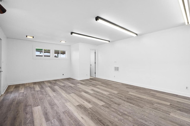 spare room featuring light hardwood / wood-style flooring