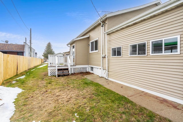 view of yard with a wooden deck