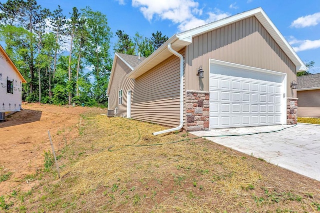 view of property exterior featuring a garage