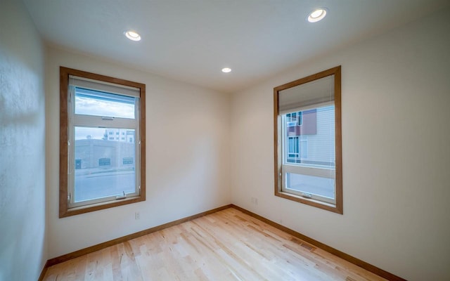 empty room with light wood-type flooring