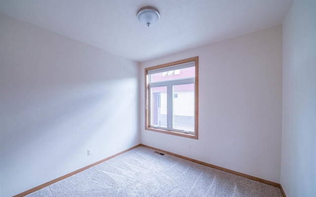 empty room with carpet floors