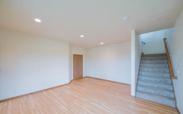 spare room featuring light hardwood / wood-style flooring