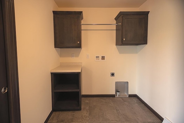 laundry area featuring cabinets, washer hookup, and electric dryer hookup