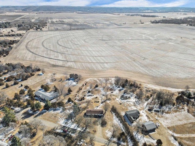 birds eye view of property with a rural view