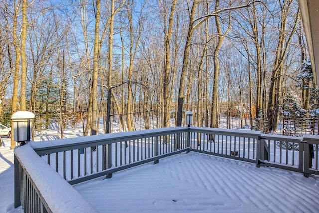 view of snow covered deck