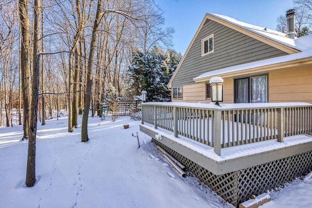 view of snow covered deck