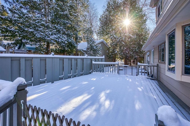 view of snow covered deck