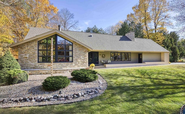 ranch-style house with a front yard