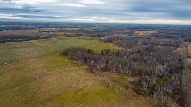 birds eye view of property featuring a rural view