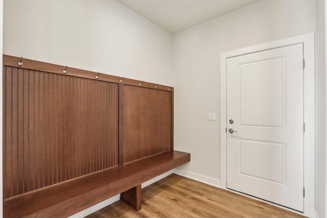 mudroom with light hardwood / wood-style flooring