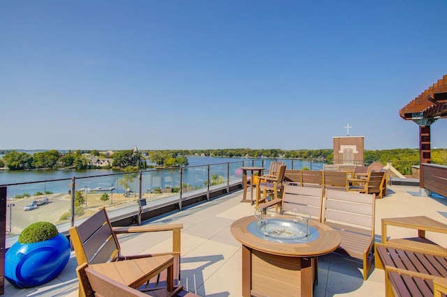 view of patio / terrace featuring a water view