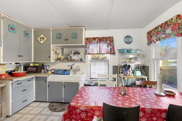 kitchen featuring gray cabinets