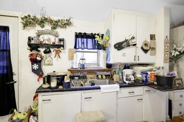 kitchen with white cabinets