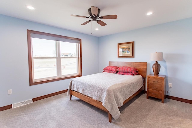 carpeted bedroom featuring ceiling fan