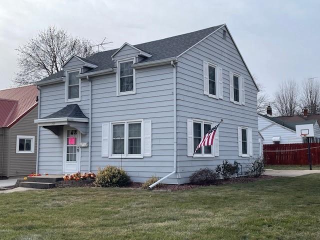 view of front of home with a front yard