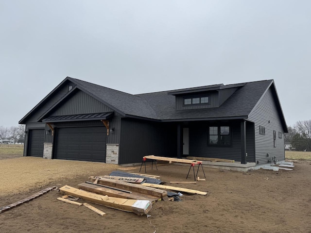 view of front of property with a garage