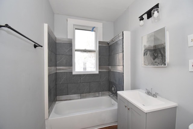 bathroom featuring vanity and tub / shower combination