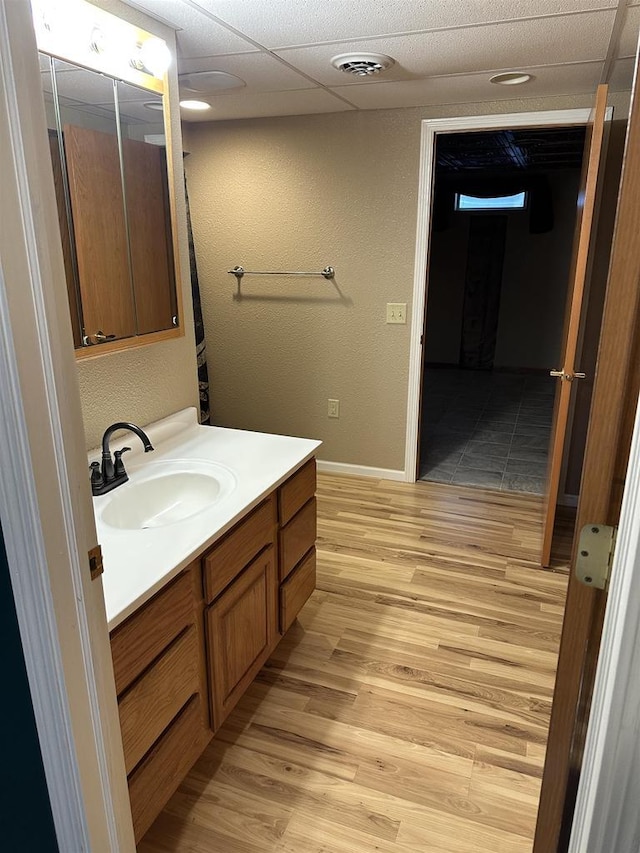 bathroom featuring hardwood / wood-style floors and vanity