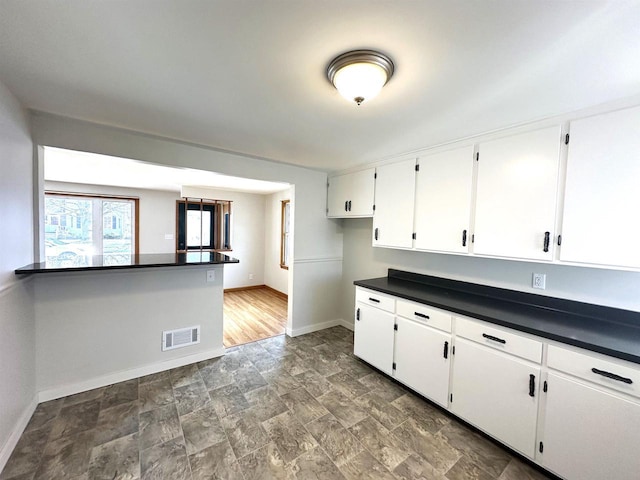 kitchen with white cabinets