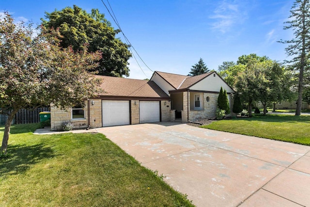 view of front facade featuring a front lawn and a garage