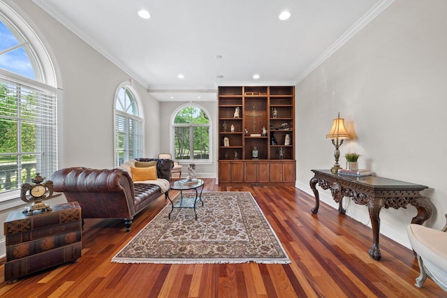 living room with crown molding and dark hardwood / wood-style flooring