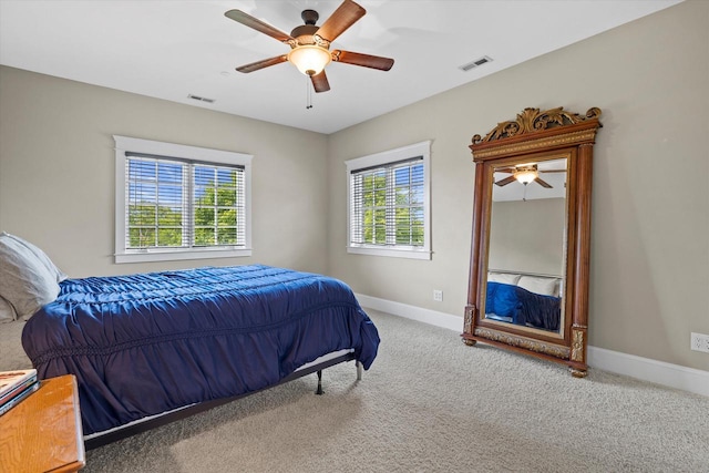 carpeted bedroom featuring ceiling fan