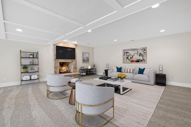 living room with a stone fireplace