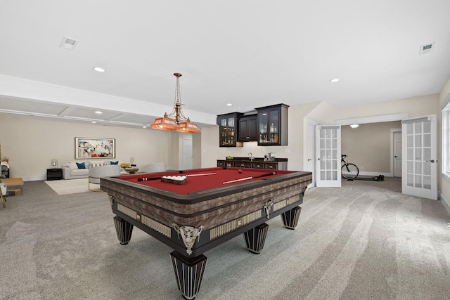 playroom with french doors, indoor bar, light colored carpet, and pool table