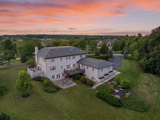 view of aerial view at dusk