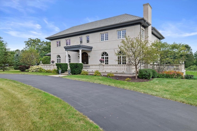 view of front of home with a front yard