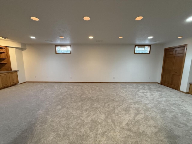 basement with light carpet