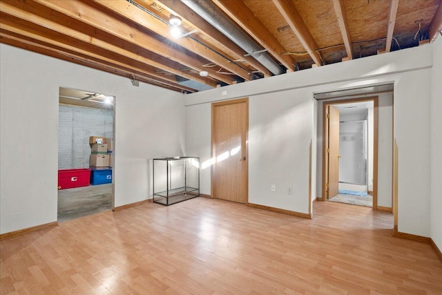 basement with wood-type flooring