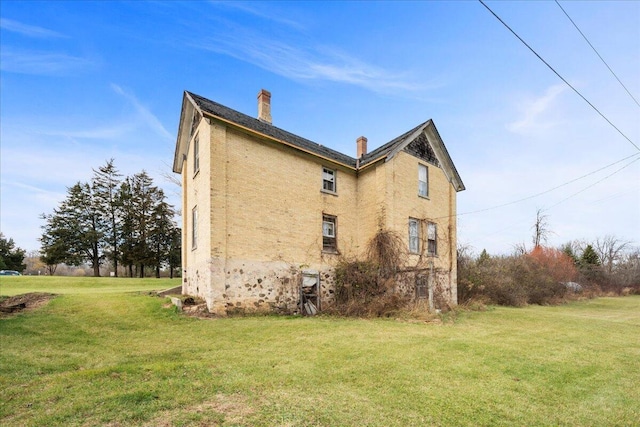 view of property exterior featuring a yard