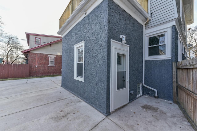 view of home's exterior with a patio area