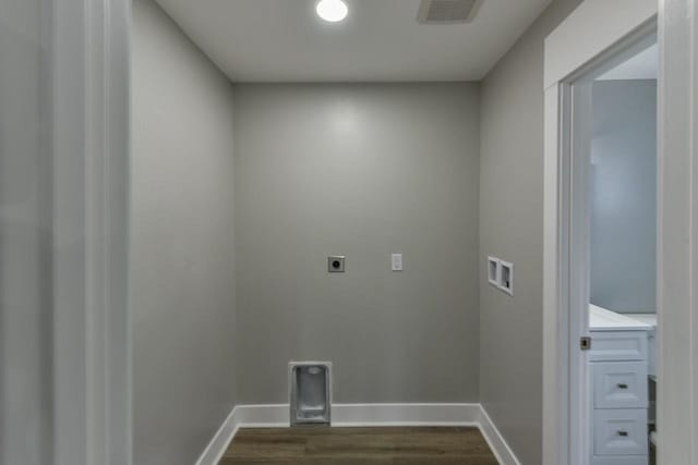 laundry room featuring dark wood-type flooring, washer hookup, and hookup for an electric dryer