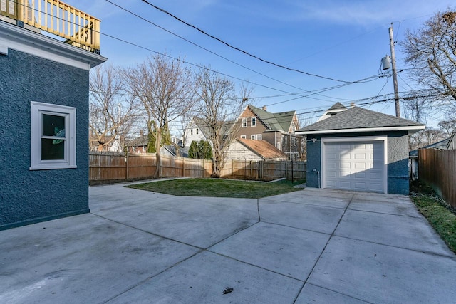 garage featuring a yard