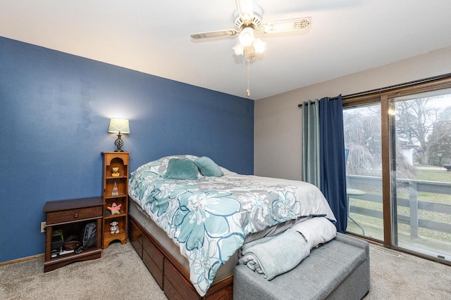 bedroom with access to outside, ceiling fan, and light colored carpet