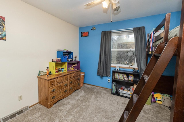 carpeted bedroom with ceiling fan