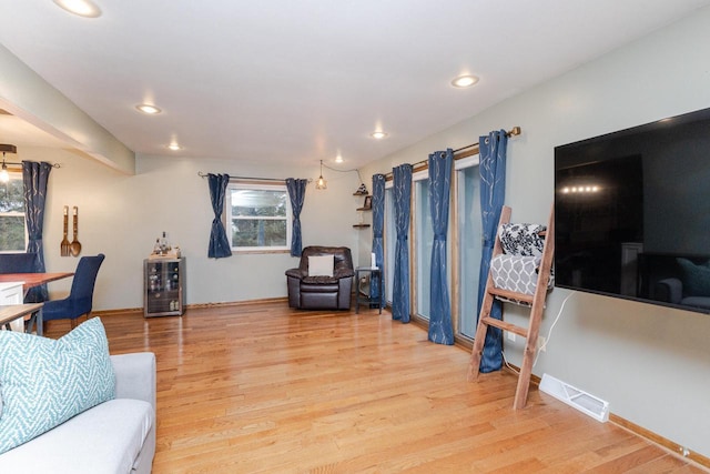 living room with hardwood / wood-style flooring