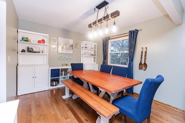 dining space featuring light hardwood / wood-style floors