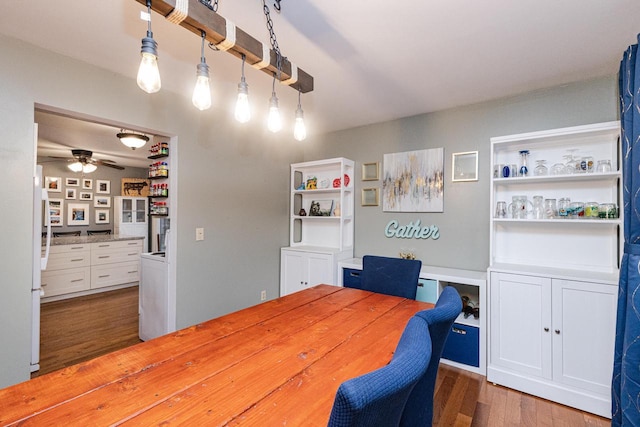 dining room featuring hardwood / wood-style flooring and ceiling fan