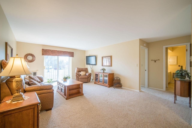 living room featuring light carpet